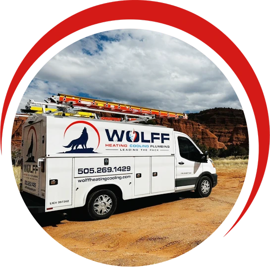 Wolff Heating, Cooling & Plumbing service van in the New Mexico high desert