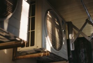 why is my ac blowing warm air
